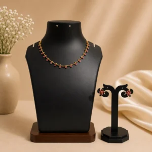 Gold-plated necklace set with red stones